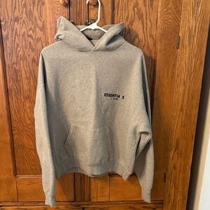 Essentials Gray Pullover Hoodie with Subtle Front Logo